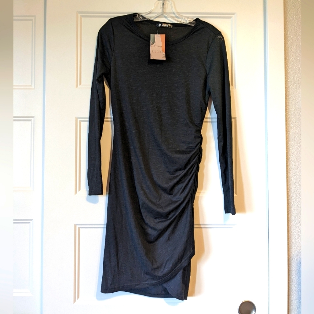 Black bodycon dress with roushing on left side.
